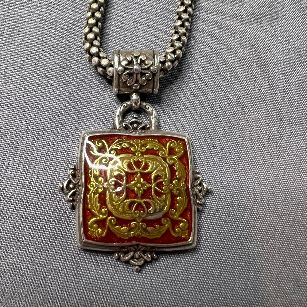 Vintage Brighton Pendant Necklace 9323 with dark red background